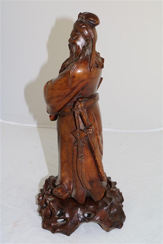 A Chinese rosewood figure of Lu Dongbin, early 20th century, total height 24cm